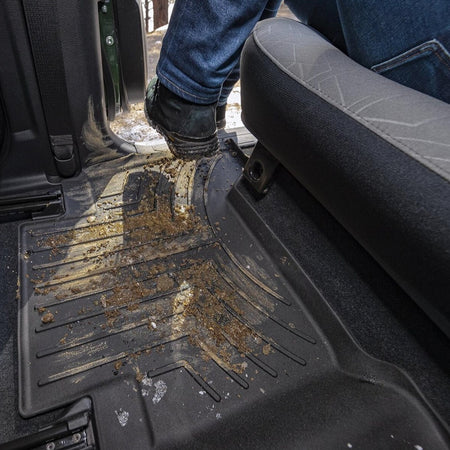 Preimium all-weather water-proof car mat by WeatherTech Switzerland. Protecting the entire 2nd row passenger floor with the unique "over-the-hump" combined second row.