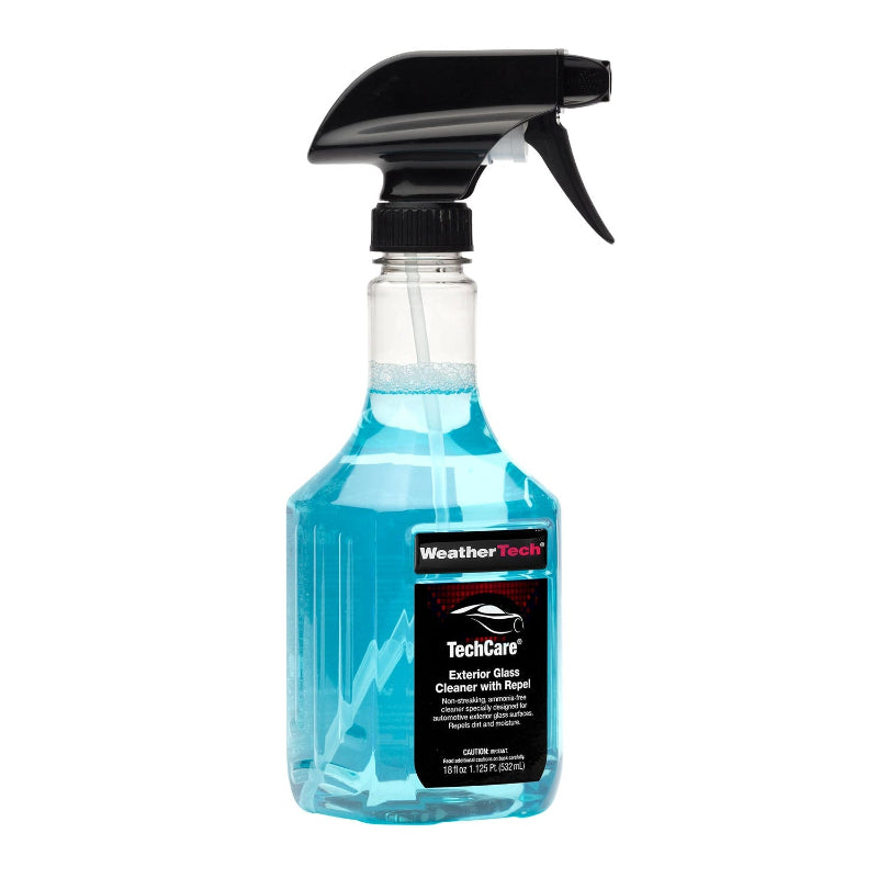 Car exterior glass cleaner Spray bottle with blue liquid and black nozzle on a white background