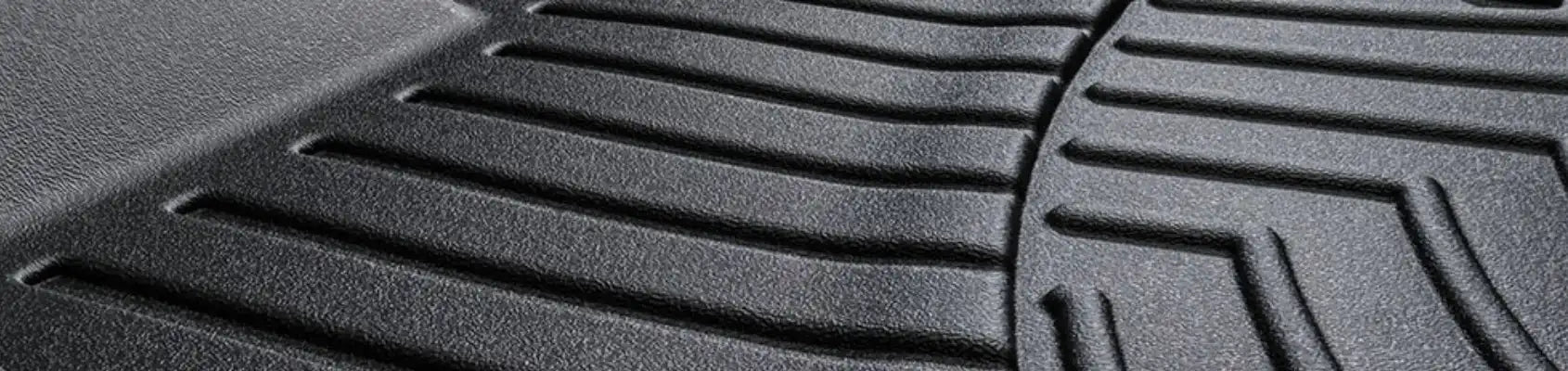 Premium heavy-duty rubber car mats, custom-fit and built for all-weather protection, made in the USA.