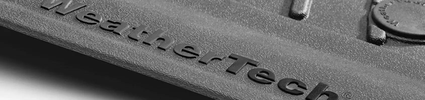 Premium heavy-duty rubber car mats, custom-fit and built for all-weather protection, made in the USA.