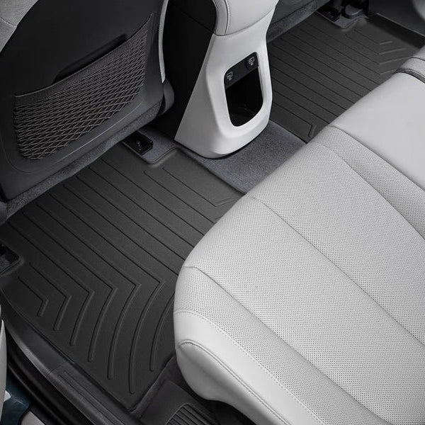 Custom fit black 2nd row floor liner/mat for sliding centre console by weathertech