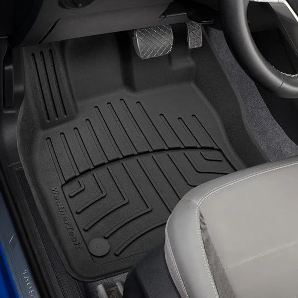 Custom Fit High Performance Black VW Taos 1st row floor liner in vehicle
