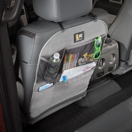 WeatherTech Light Grey Car Seat Back Protector with kids in car entertainment items and water bottle