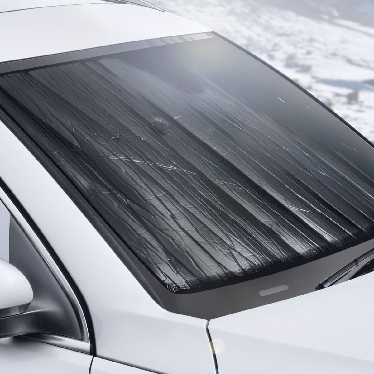 The reverse side of the WeatherTech "dual-sided" front sunshade, helps to keep the windscreen frost free in the winter. By absorbing the UV with a think insulation layer formed behind the windscreen, the window stays warm, preventing overnight frosting.