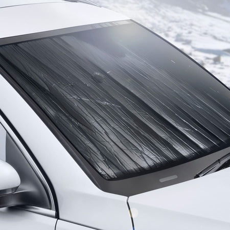 The reverse side of the WeatherTech "dual-sided" front sunshade, helps to keep the windscreen frost free in the winter. By absorbing the UV with a think insulation layer formed behind the windscreen, the window stays warm, preventing overnight frosting.